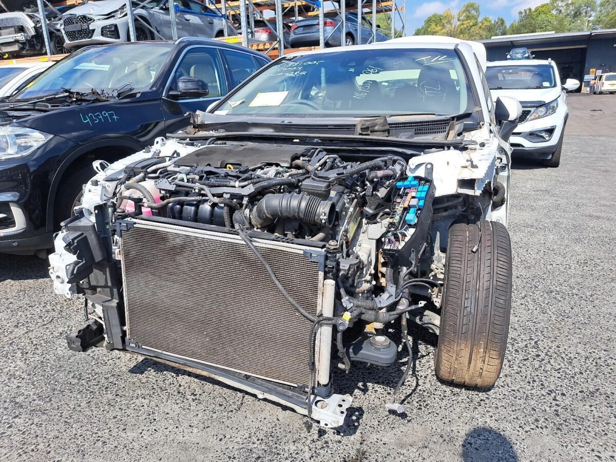 Toyota Camry front cut with 2.5L four cylinder engine, radiator and radiator support